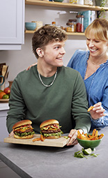 Olly and his mum with burgers