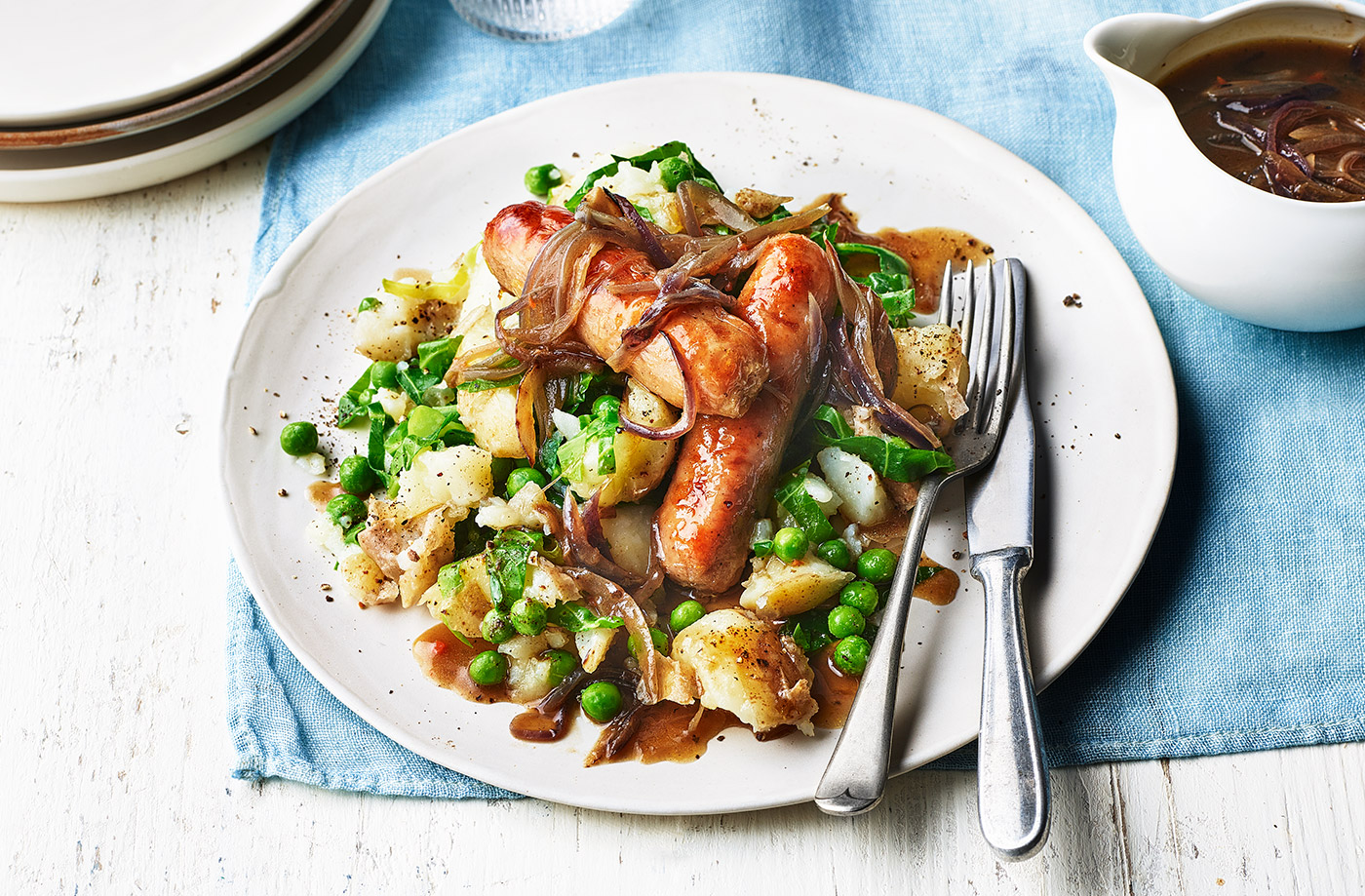 Bangers and smashed spring potatoes recipe