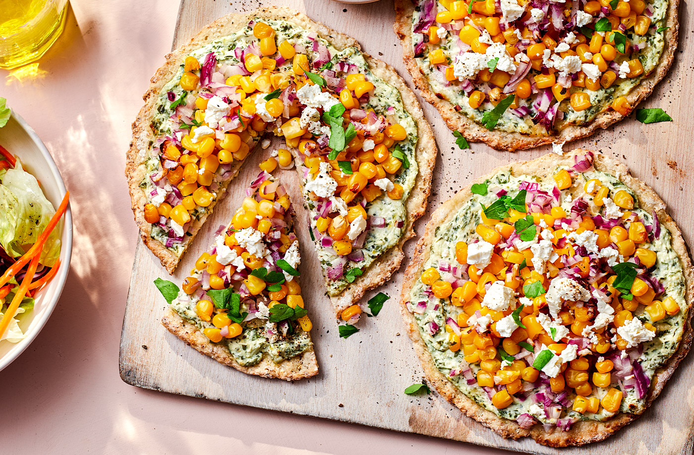 Cauliflower pizzettes with sweetcorn and feta recipe