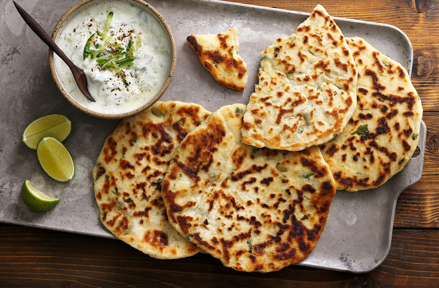 Garlic and coriander flatbreads with raita recipe