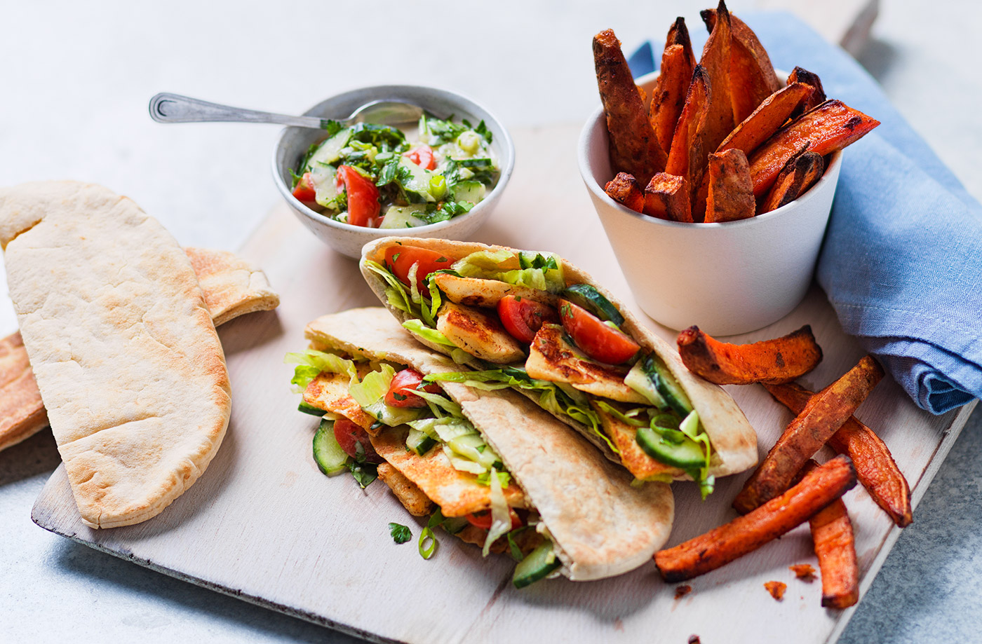 Halloumi pittas with sweet potato wedges recipe