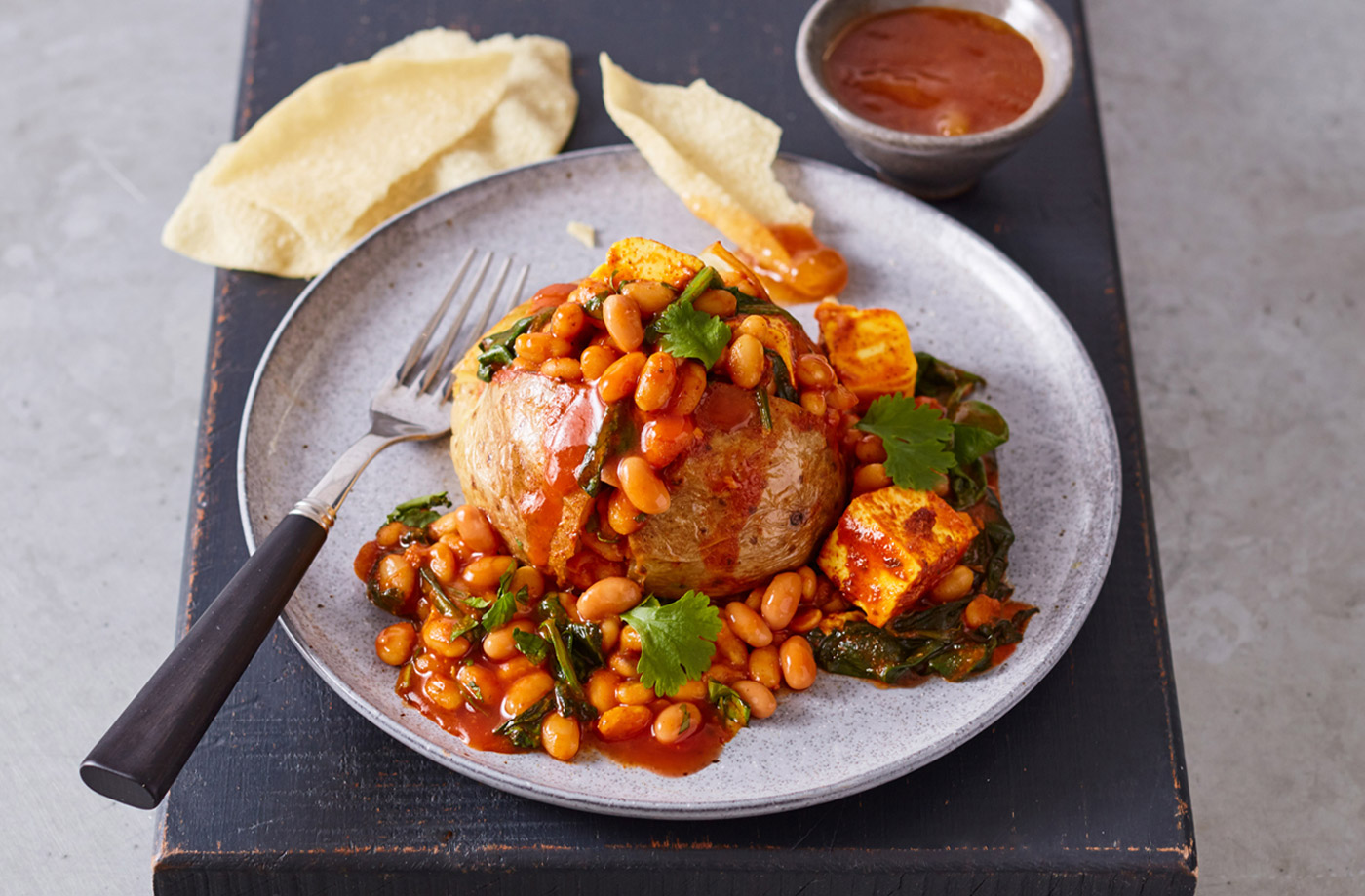 Jacket potatoes with curried beans and paneer recipe