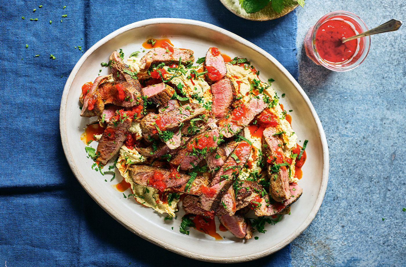 Grilled lamb with houmous and harissa recipe