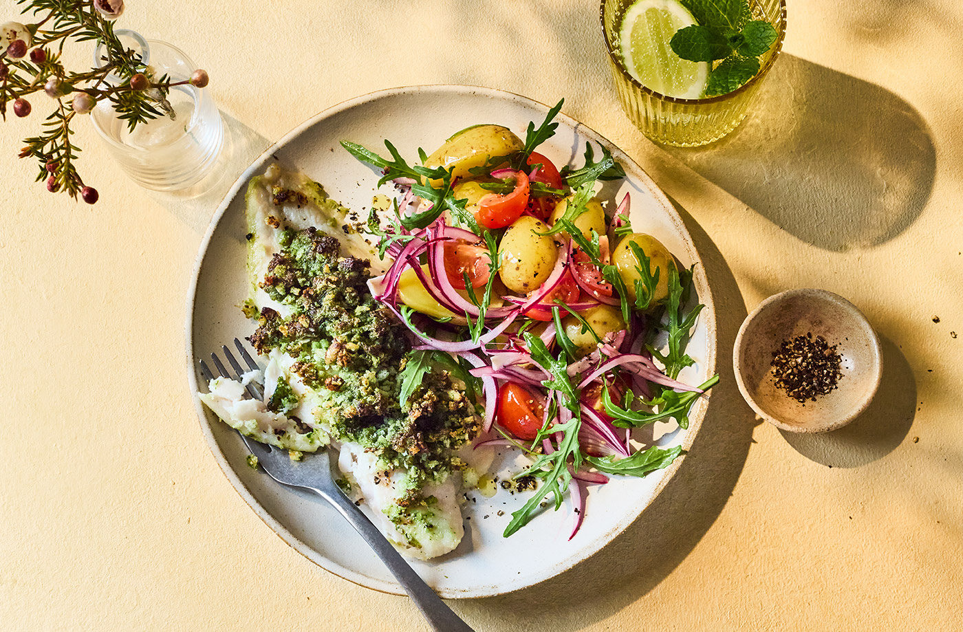 Pesto-crusted fish with potato, tomato and rocket salad recipe
