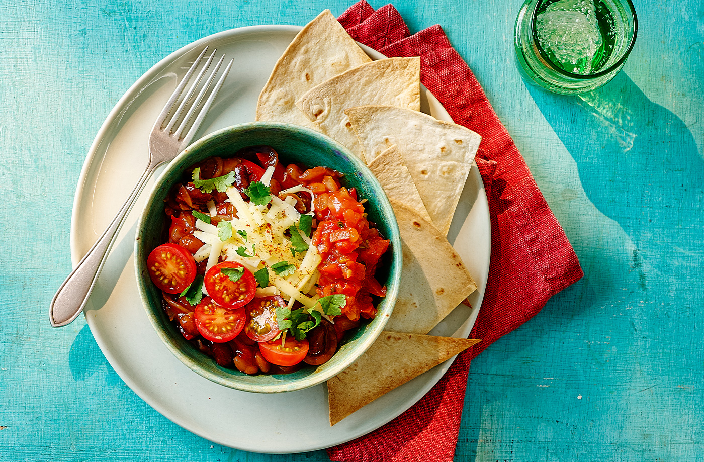 Quick bean chilli bowl with tortillas and cherry tomatoes recipe