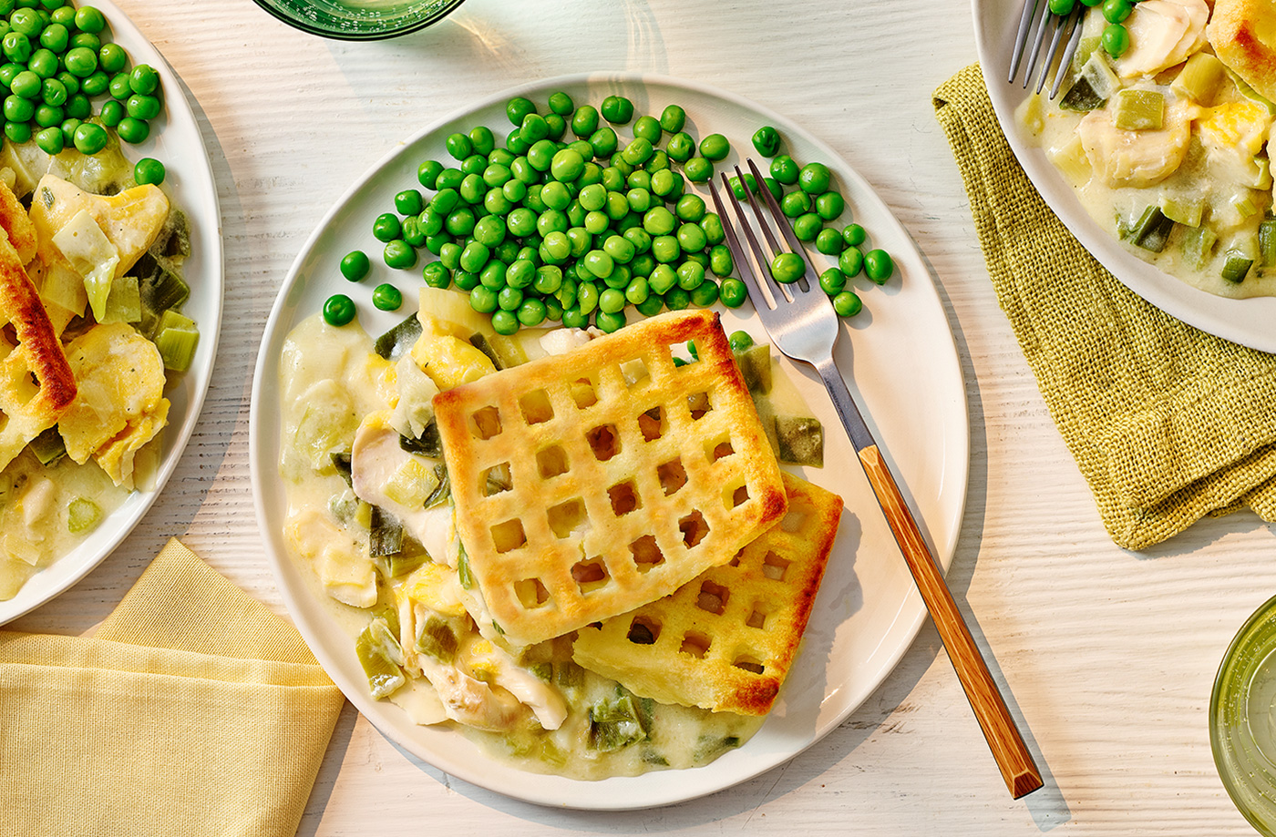 Creamy leek smoked fish with potato waffle topping recipe