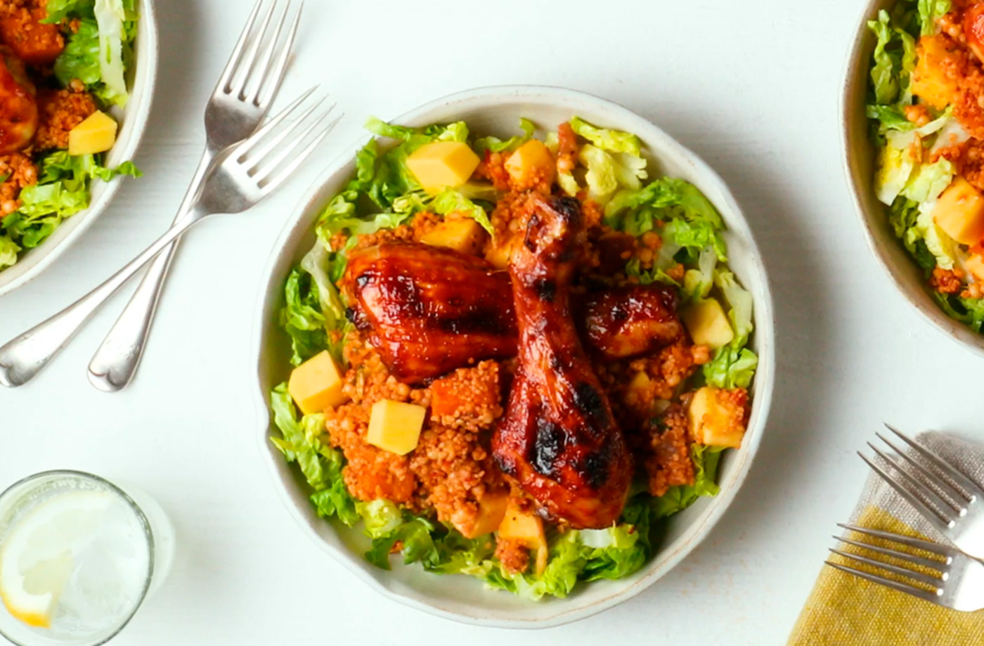 Sticky chicken drumsticks with mango couscous recipe