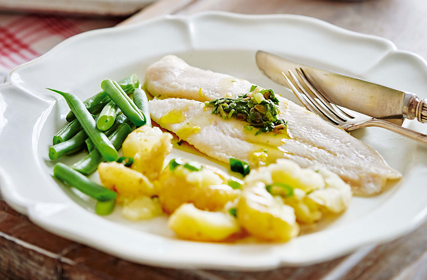 Baked fish with watercress salsa and crushed potatoes recipe