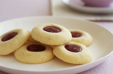 These easy biscuits combine a dairy-free homemade shortbread cookie recipe with jammy dodger-like gooey jam centres, and they're a great way to get the kids involved in the kitchen too!