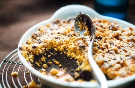 We love a fruit crumble, of course we do, but how about a chocolate version? Indulgent dark chocolate ganache with a crunchy crumb on top, we bet you’ll adore this alternative. The recipe will serve a lucky four people.