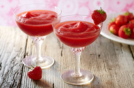 Strawberries make such summery, balanced daiquiris. Freezing the berries in advance means you don’t have to add much ice to get that slushy consistency