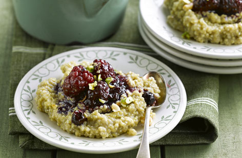 Start the day with a bowl of fluffy quinoa, sweet blackberries and a sprinkling of pistachios  