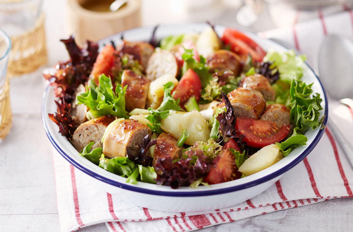 Sticky sausage and crushed new potato salad recipe
