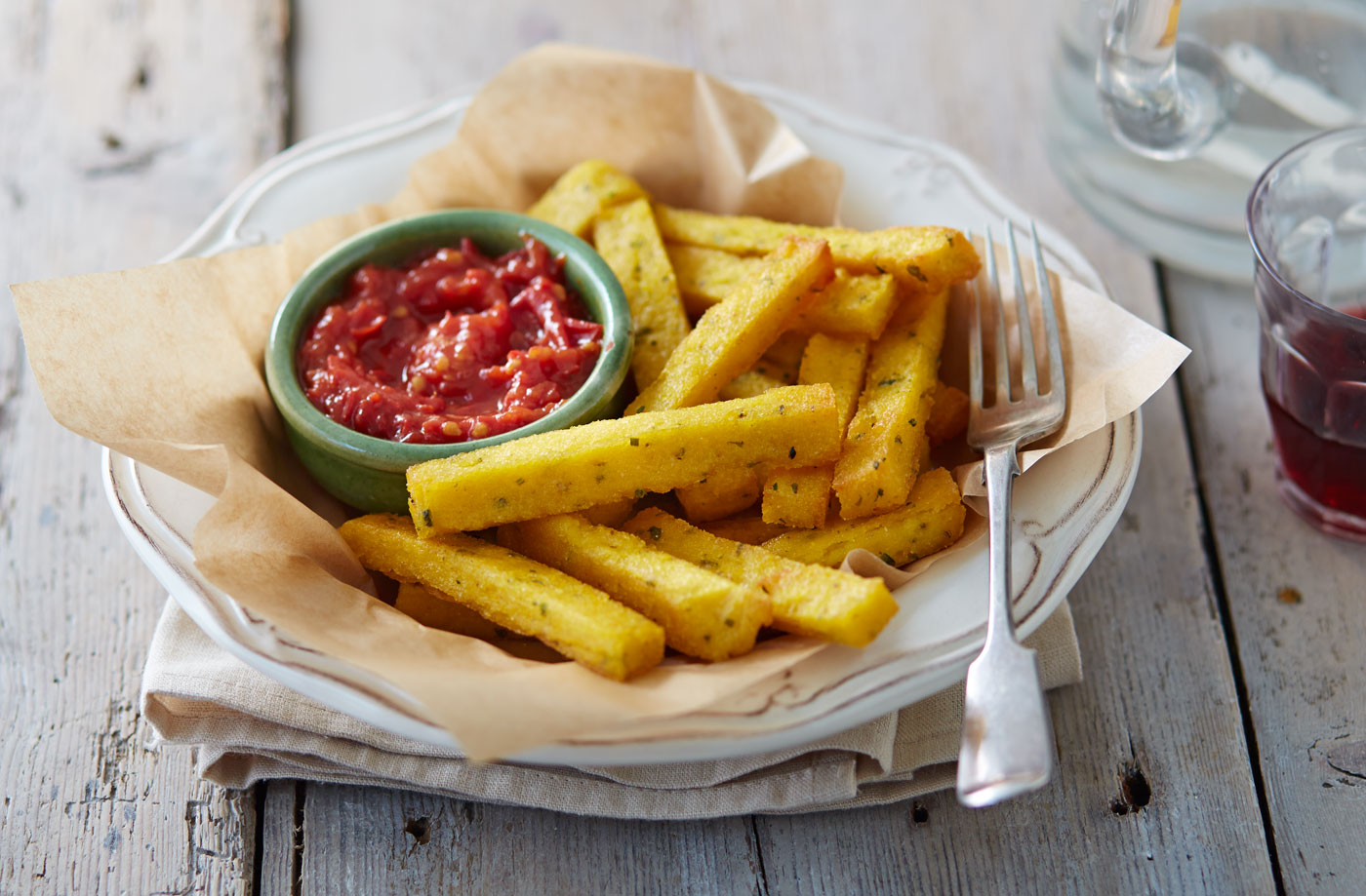 Polenta chips with Parmesan, herbs and a chilli-tomato relish recipe