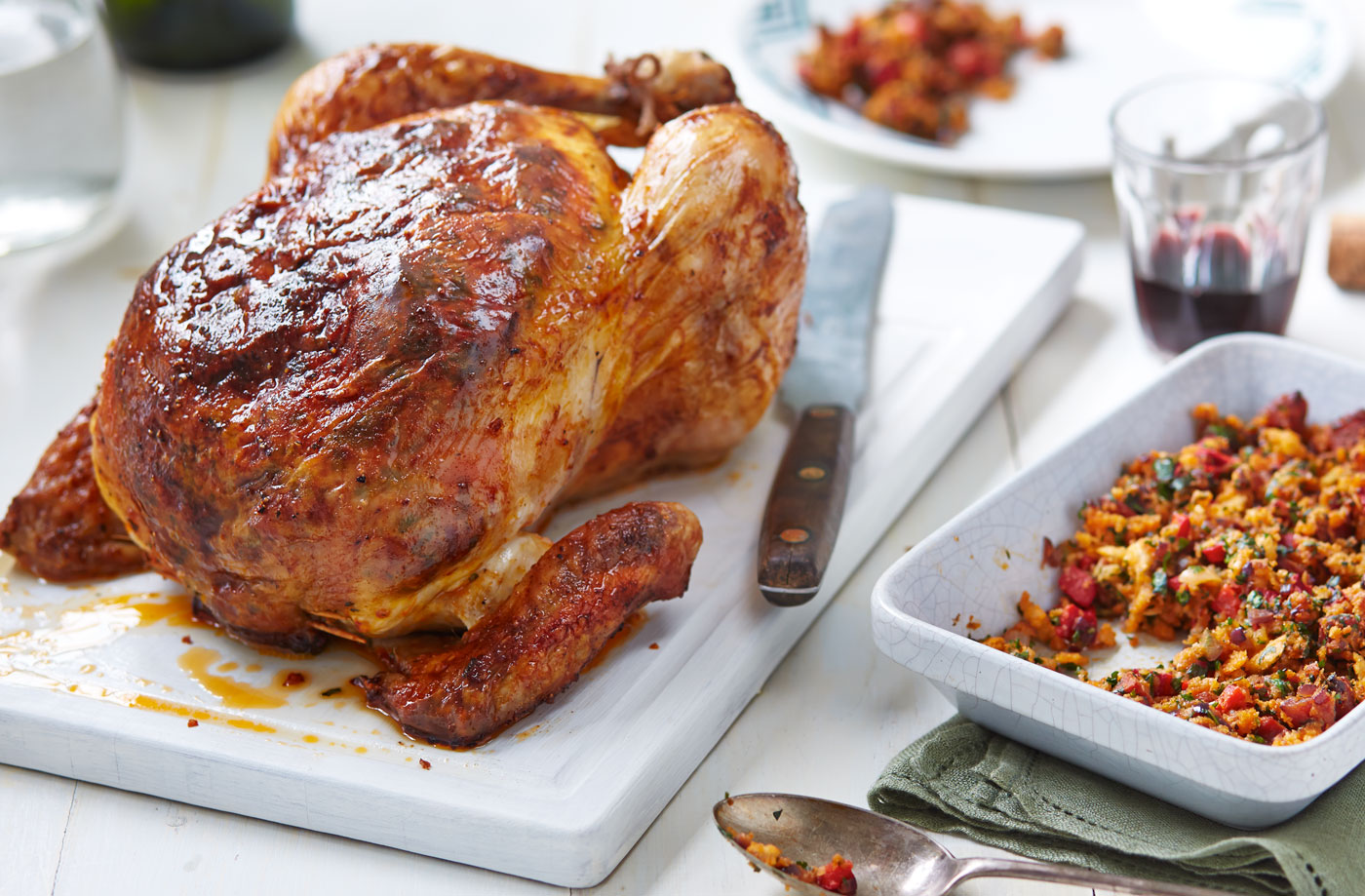 Spiced roast chicken with herb stuffing recipe