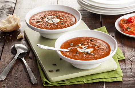 A flavoursome soup made of roast tomatoes, crème fraîche and pumpkin seeds