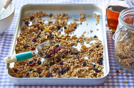 Hearty and full of crunch, this wholesome breakfast granola will fill you up and keep your energy levels high all the way through to lunchtime and is perfect for both gluten-free and nut-free diets, combining honey and syrup with berries and raisins. 