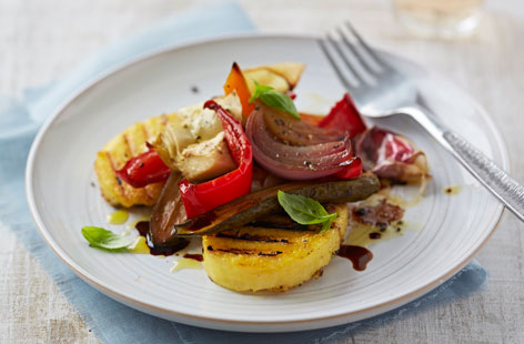 Golden, versatile polenta is great for those on a wheat-free diet, and it tastes sensational with these flavoursome roasted vegetables