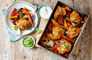 Chicken fajita traybake with pea 'guacamole'