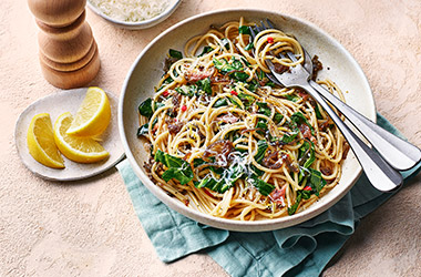 Sausage and pea risotto, spaghetti with greens and anchovies, butternut and black bean burritos...