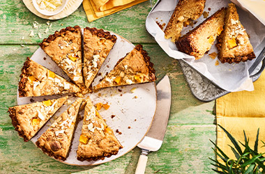 White chocolate and mango flapjack blondie tart
