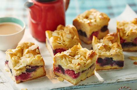 A sweet and delicious delight that's bursting with summer flavour, this tasty bake with seasonal berries, flaked almonds and maple syrup is sure to go down a treat and will be right at home in your picnic hamper
