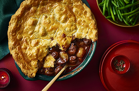 Cosy up with a comforting twist on a classic! Packed with tender mushrooms, this rich French-style stew is topped with crisp puff pastry. Serve with steamed greens for an impressive veggie feast.