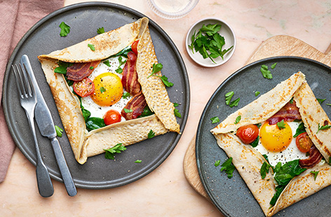 Rustle up something a little different for Pancake Day with these fully loaded galettes - topped with egg, bacon, tomatoes and spinach, they can be enjoyed at any time of day.