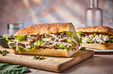 Turn your favourite salad into a hearty sandwich. Coat ready to eat chicken in homemade Caesar dressing with capers, then load into a ciabatta roll with anchovy fillets and Parmesan shavings - this is sure to liven up lunchtime.