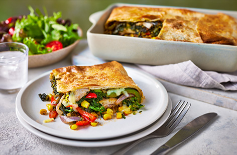All your favourite Mexican flavours wrapped in a tostada-style pie is a recipe for new family favourite – comforting, familiar, but interesting and so simple to make. Pan-fry your chicken, veg and spices, encase in tortilla wraps with grated cheese and pop in the oven to crisp up and create a melty, oozy middle. Dive in!