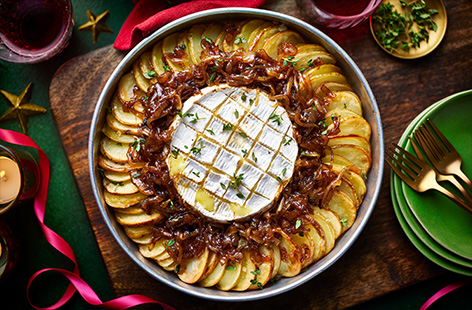 You can't go wrong with a baked Camembert at Christmas. Take it to the next level by serving with  crispy potatoes for dipping and sticky French onions. This is sure to go down a treat at any festive dinner party.