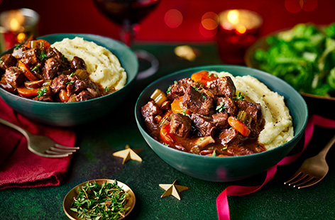Impress your guests this Christmas with Niyi Obafemi-Olopade's mulled wine braised beef. Slow cook your beef for 2 hours with spices and red wine until it's tender and pulls apart. Serve with buttery mash and cabbage - merry Christmas!