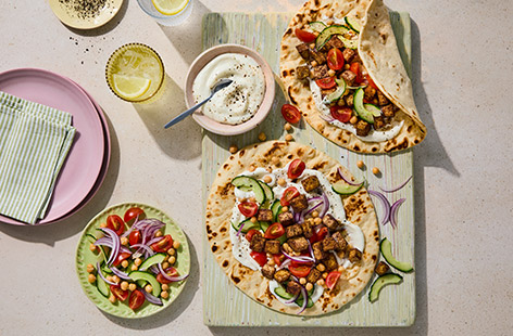 These air-fryer tofu flatbreads include homemade toum – a trending Lebanese garlic dip that’s creamy, punchy and totally addictive. It’s traditionally made by emulsifying garlic, oil and lemon juice. We’ve added a splash of aquafaba (the liquid from a tin of chickpeas) to help stabilise the mix and make this sauce much more foolproof. This is quick, easy and delicious Lebanese food you can enjoy at home!