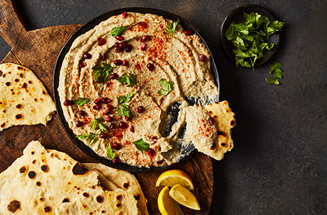 Take a shortcut and use an air-fryer to cook your aubergines and create this wonderfully creamy Levantine dip, baba ganoush. Serve with homemade warm flatbreads for an impressive starter or side at a dinner party – or for relaxed weekend feasting.