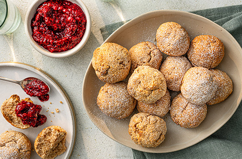 Nutritionist Rhiannon Lambert's healthy twist on classic doughnuts are great for when you're craving something sweet. The dough is made with yogurt and almonds then baked in the oven until golden. Serve with a fruity raspberry and chia seeds for dipping!
