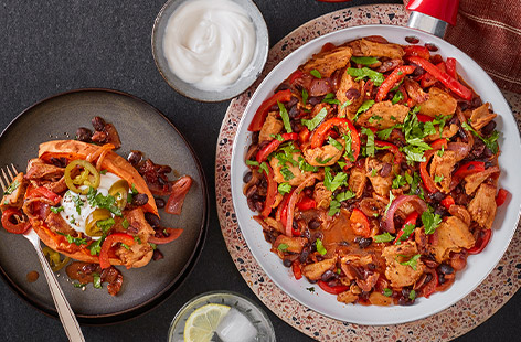 This comforting, vegan one-pot is jam-packed with black beans, chicken-style pieces, ground cumin and smoky chipotle paste, making for a delicious hearty dinner. Serve over sweet potato jackets or rice and don't forget the lime wedges, for some zing!