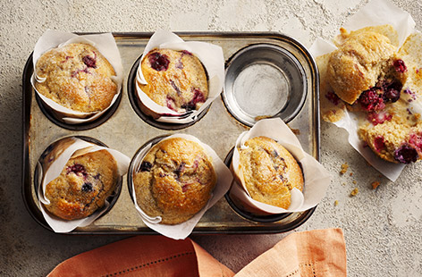 Fluffy vegan muffins are made with storecupbaord ingredients. We use frozen Black Forest fruit, but you can use whatever you have at home