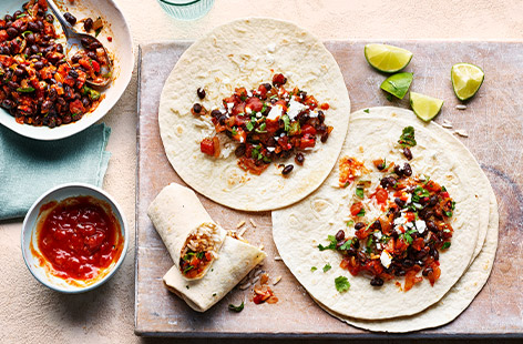 The whole family will love this smoky veggie burrito recipe. Load lightly spiced butternut squash and black beans into tortillas with rice, then top with crumbled Greek-style salad cheese for extra tang. Wrap it all up and enjoy the flavour fiesta. 
