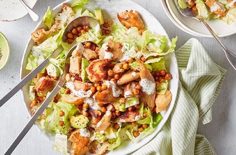 This vegan take on a Caesar salad features chicken-style pieces, crispy spiced chickpeas and creamy avocado. Dig in!