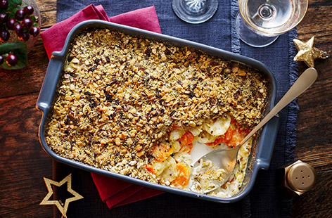 Give your Christmas mains some excellent company with this crisp and cheesy root vegetable gratin 