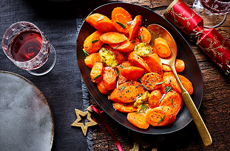 Tender carrots with a sweet and sticky compound butter make for the perfect Christmas side dish