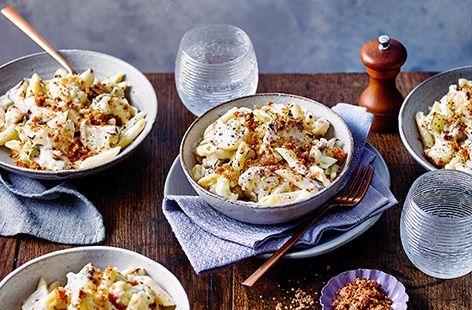 Warm up this winter with a comforting twist on classic cauliflower cheese. This simple pasta recipe makes it easy to rustle up a delicious dinner, combining roasted cauliflower and penne in a creamy, cheesy sauce, all topped with crunchy breadcrumbs.