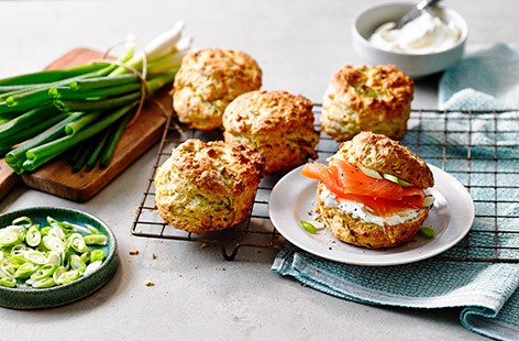 Sweet and mild spring onions and sharp cheddar make for a great taste combo - add smoked salmon and soft cheese to bring this snack to the next level