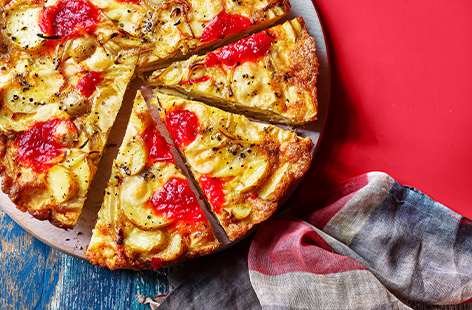 The classic Spanish tortilla gets a touch of British flavours with the help of sharp mature Cheddar and sweet chilli jam