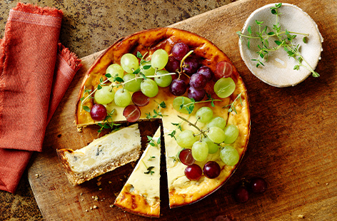 Ever wished your final dinner party course could be bundled together and sliced? This cheeseboard cheesecake, packed with ricotta, cheddar and Stilton, takes the biscuit!