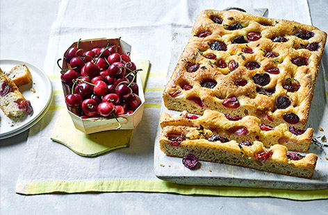 Sweet and tart, juicy cherries are the perfect ingredient in a light and fluffy Italian focaccia