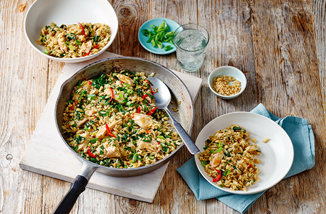 This simple salmon fried rice uses wholegrain rice as a time-saving tip and nutty flavour