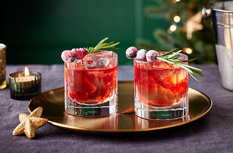 Give the classic Old Fashioned a festive twist with the addition of seasonal cranberry juice. This is a great cocktail to serve with dessert, or as an after-dinner drink.  