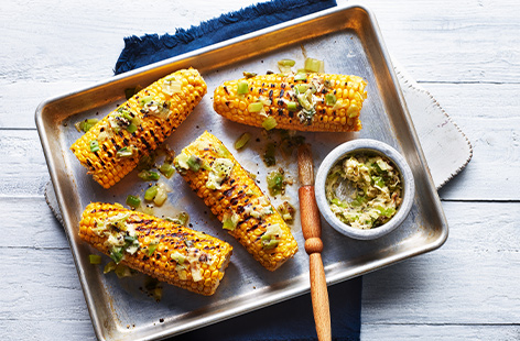 Corn on the cob never tasted so good with this sweet and smoky charred spring onion butter