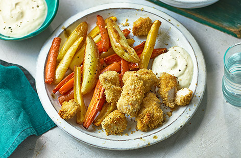 Nutrient-packed couscous chicken nuggets and carrot, parsnip & potato make up this healthy midweek option
